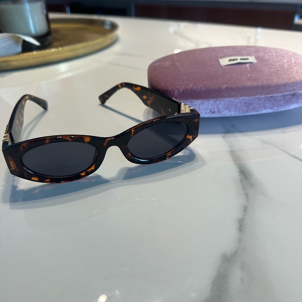 Miu Miu Tortoise Shell Sunglasses